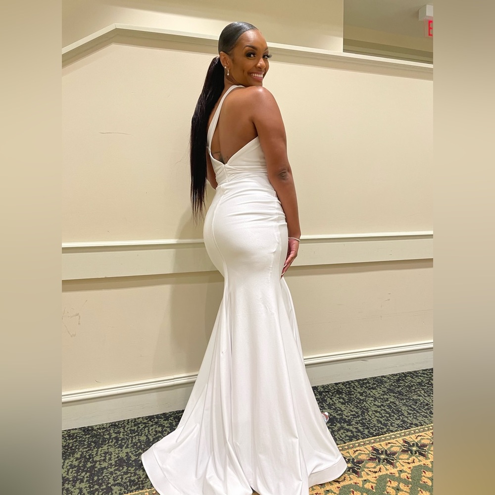 White Jessica Angel floor length dress.